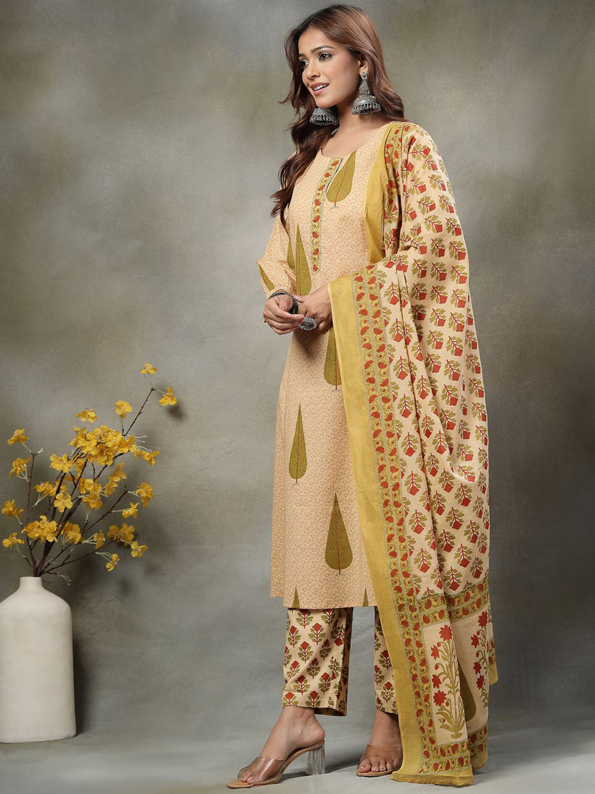 Front view of a beige Anarkali kurta set with palazzo online Canada, featuring floral embroidery and elegant dupatta.