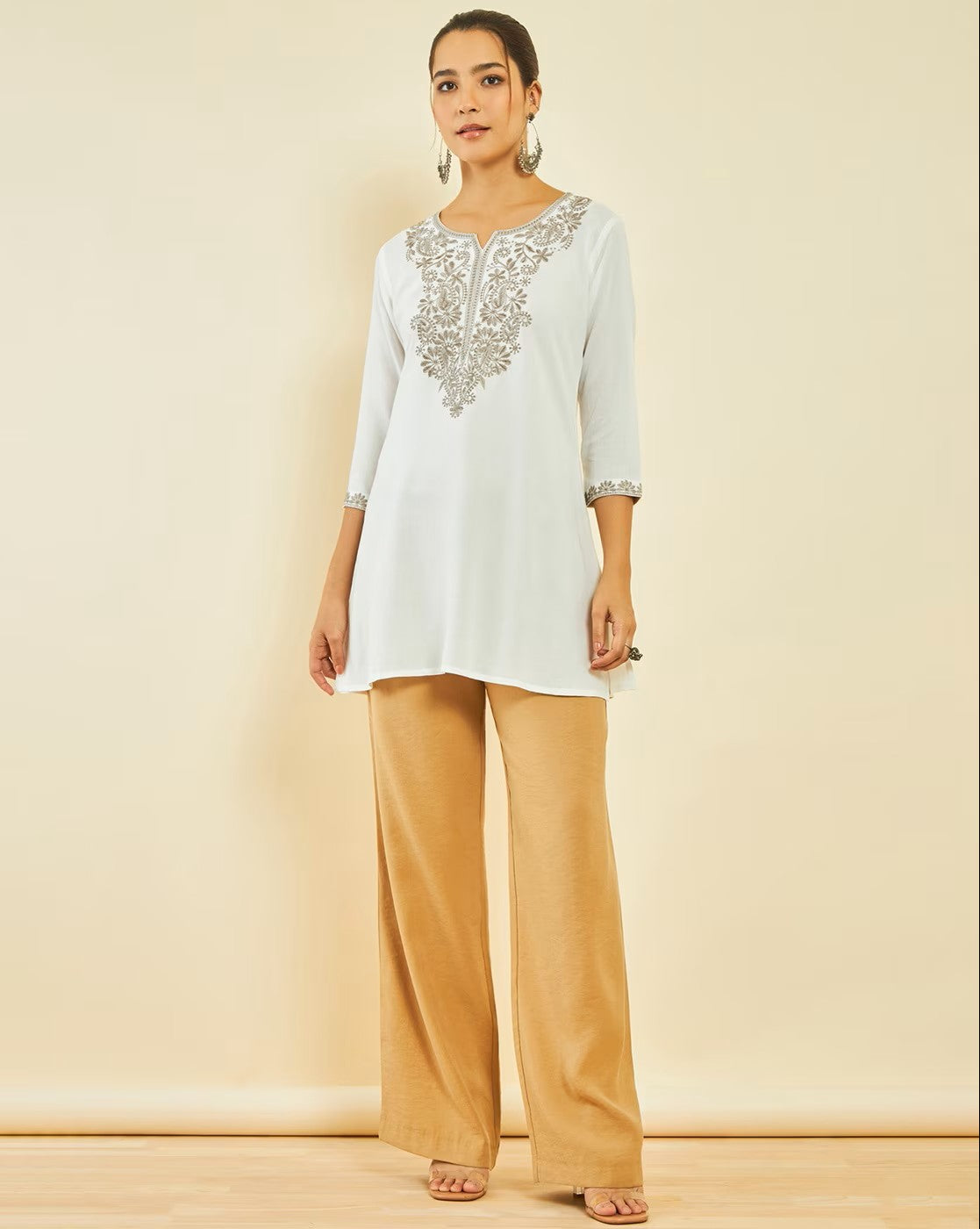 Aromie white embroidered long sleeve tunic with beige palazzo pants shown for sleeveless cotton peplum top listing