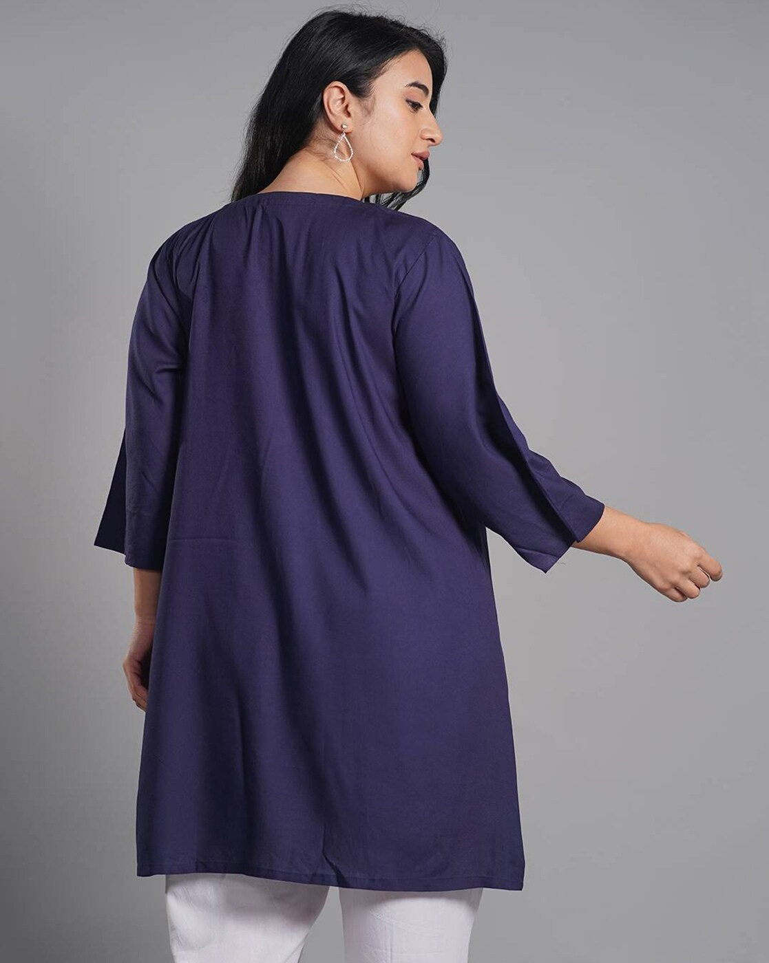 Back view of aromie Embroidered V-Neck Top Women navy tunic with three quarter sleeves on model