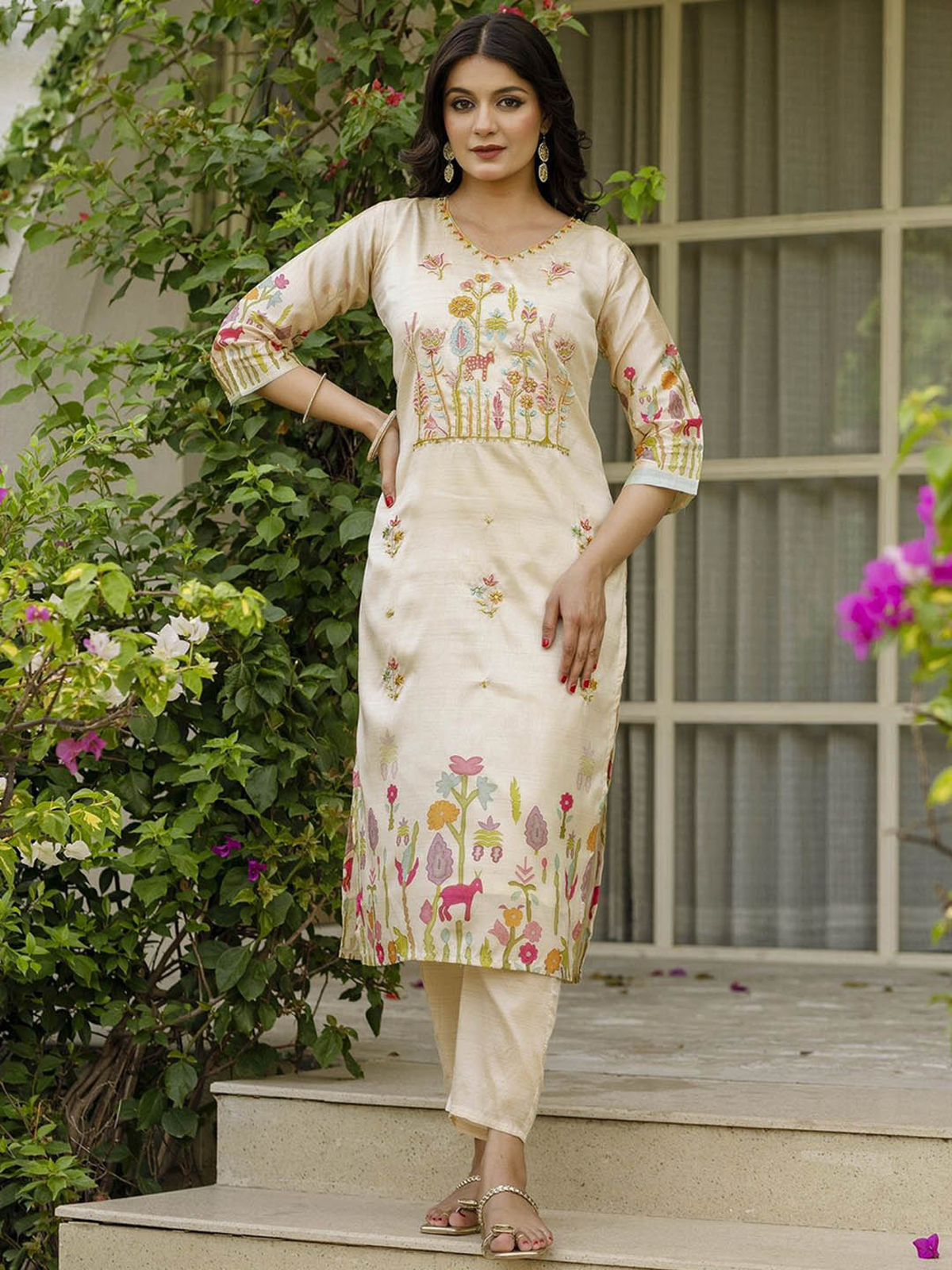 Aromie cream three piece kurtha showcasing an orchid floral embroidered kurta set with pastel botanical embroidery