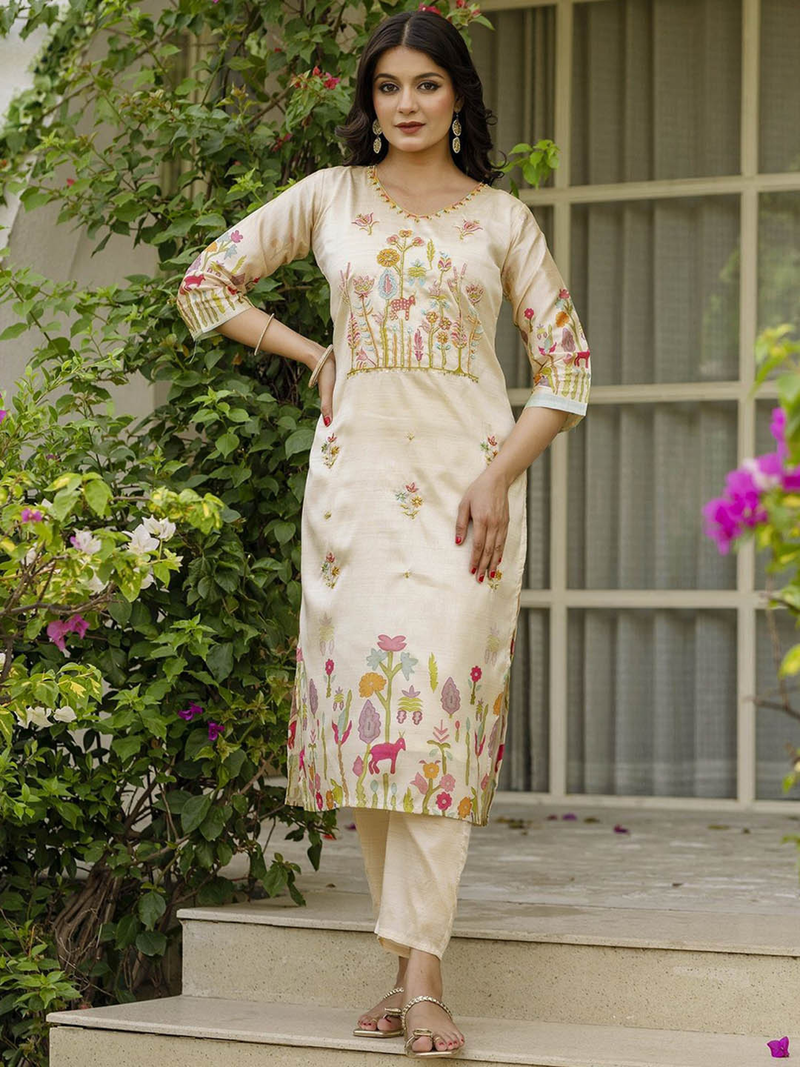 Aromie cream three piece kurtha showcasing an orchid floral embroidered kurta set with pastel botanical embroidery