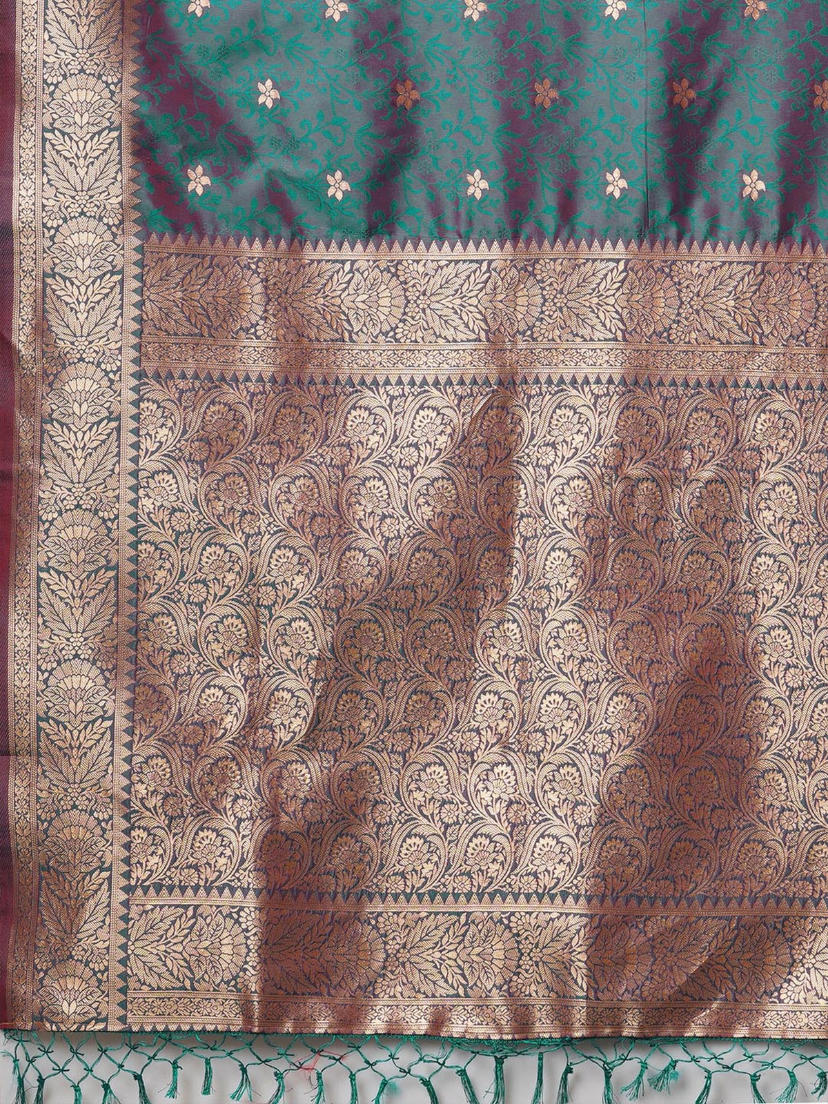 Detail view of a green party wear Banarasi saree with intricate gold patterns for special occasions in Canada
