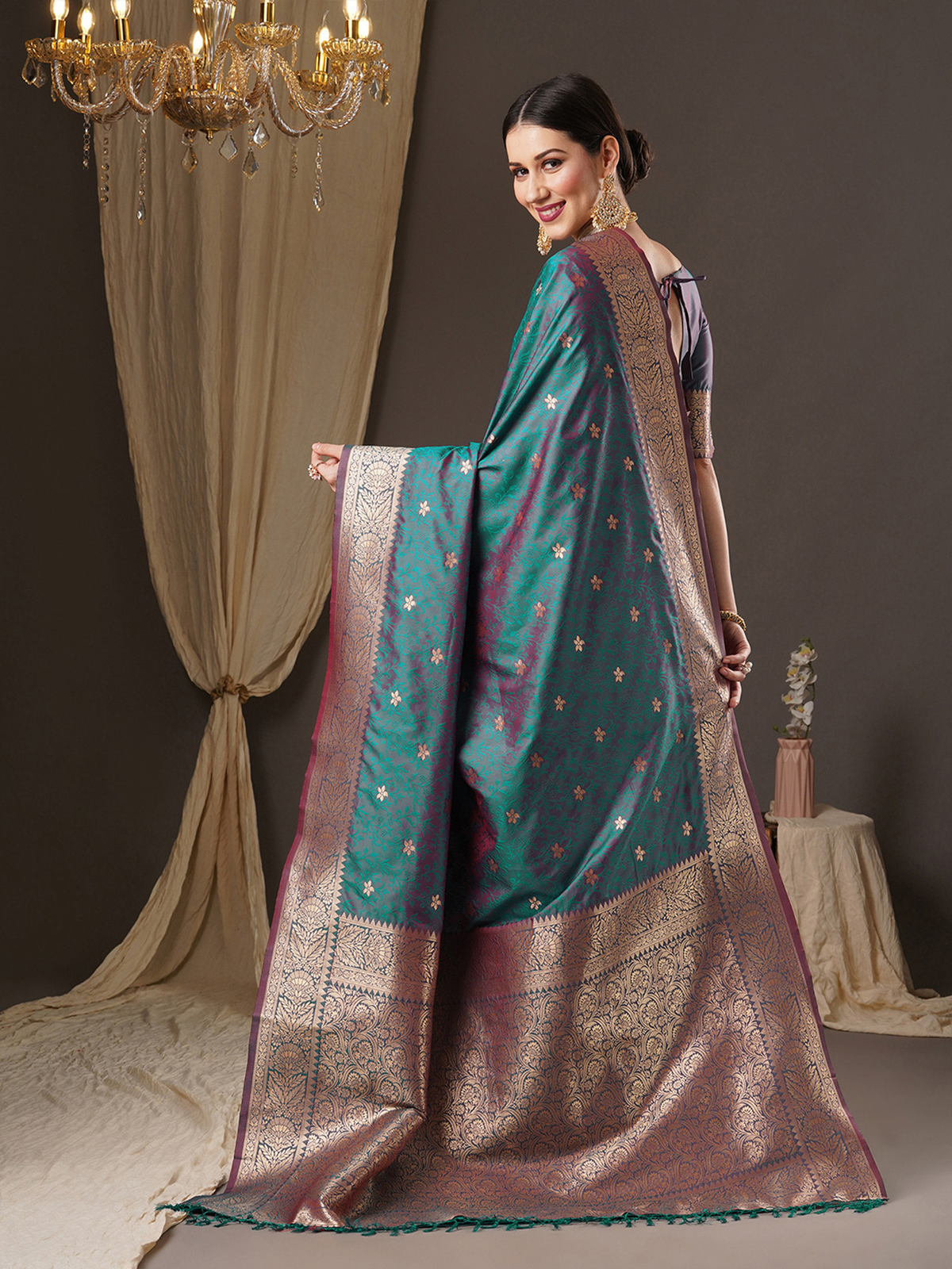 Teal and gold party wear Banarasi saree from Aromie with intricate detailing, perfect for festive occasions in Canada