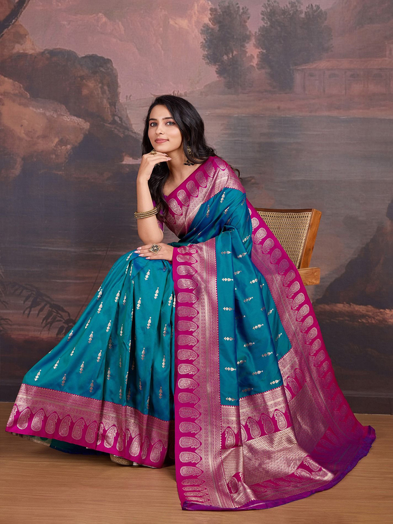 Banarasi saree USA in teal and magenta silk with intricate patterns, perfect for weddings and special occasions