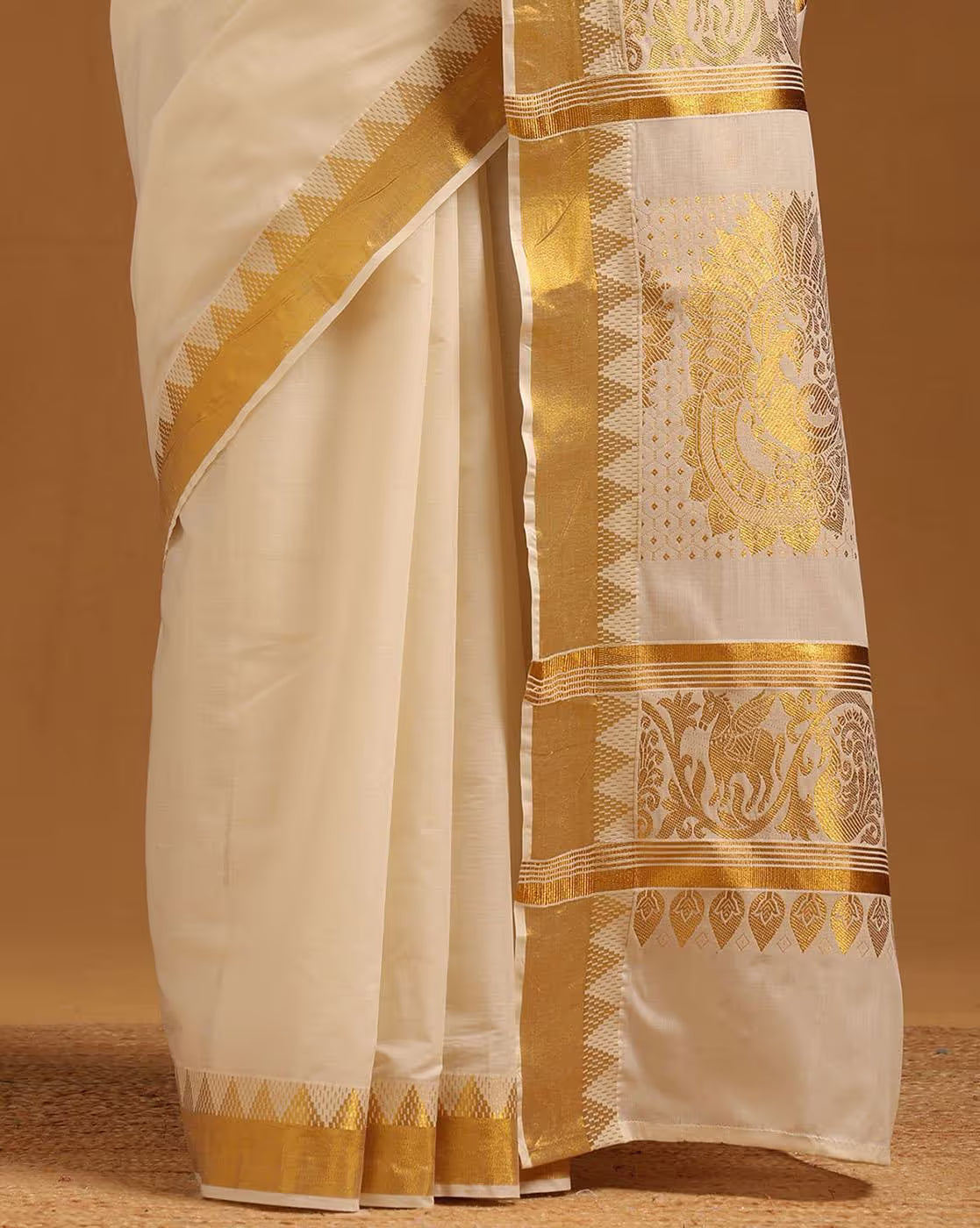 Elegant Banarasi Silk Saree in Cream with Gold Detailing for Wedding and Festive Occasions