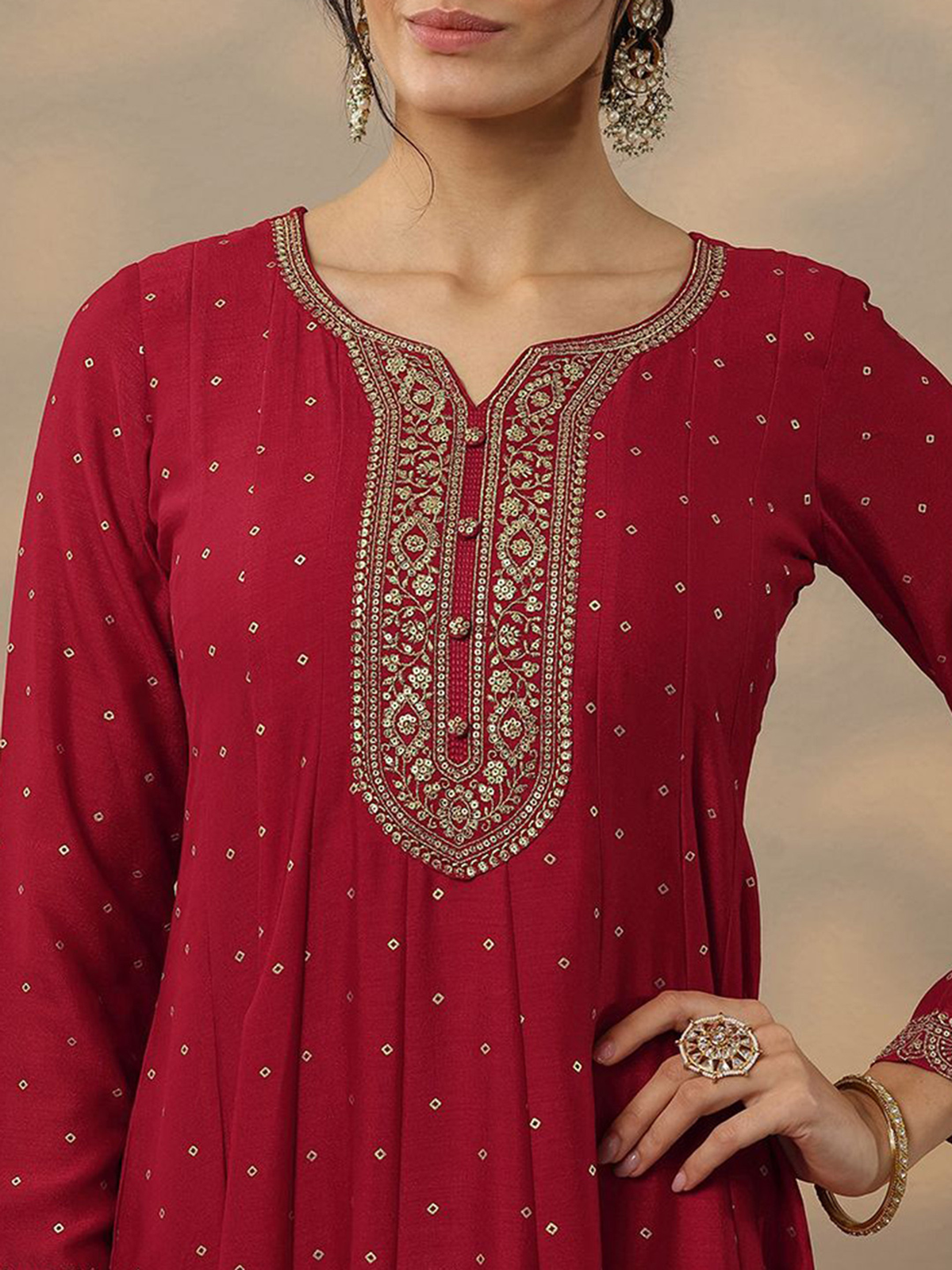 Aromie three piece Kurtha set featuring intricate embroidery, designed as a Bandhani silk gown with dupatta