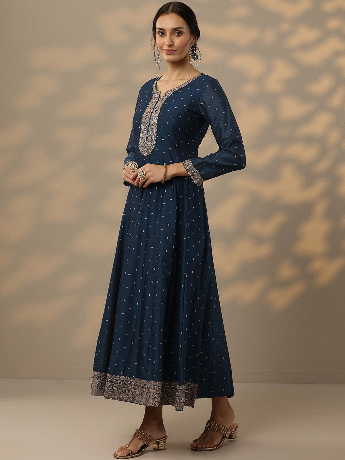 Elegant bandhani silk gown with dupatta in dark blue, featuring intricate embroidery and long sleeves