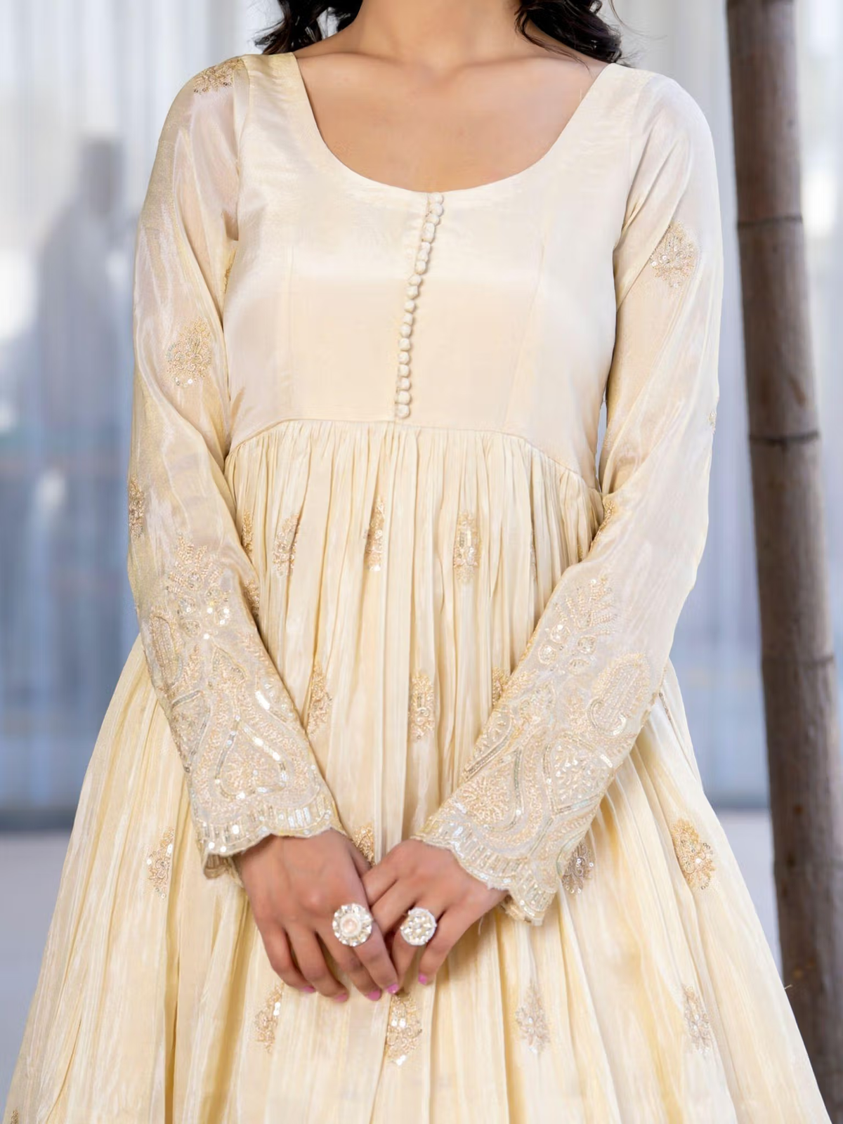Aromie three piece kurtha in cream with intricate gold embroidery and full sleeves bright red floral co-ord set