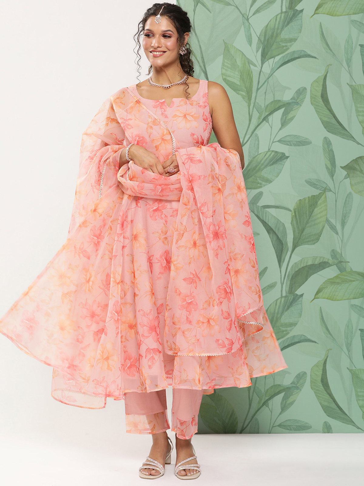 Aromie peach floral three piece embroidered cotton kurta set with sleeveless anarkali kurta dupatta and straight pants