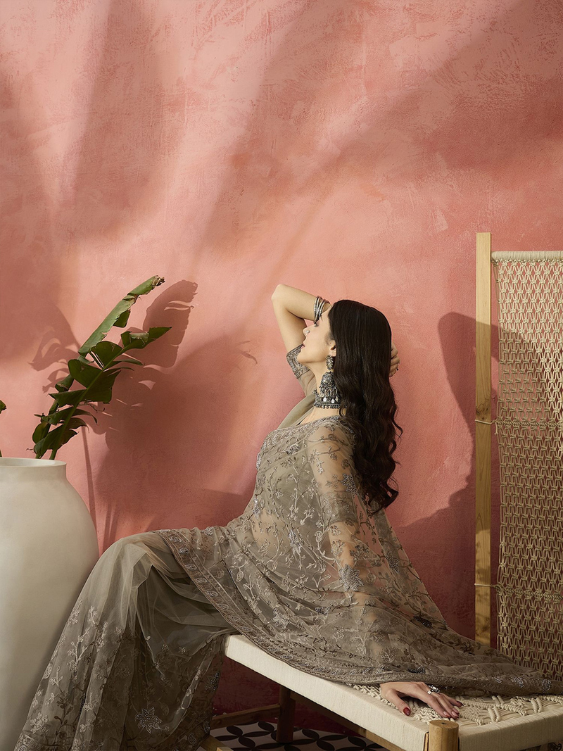 Beige saree Canada in sheer fabric with intricate embroidery, perfect for weddings and festive occasions