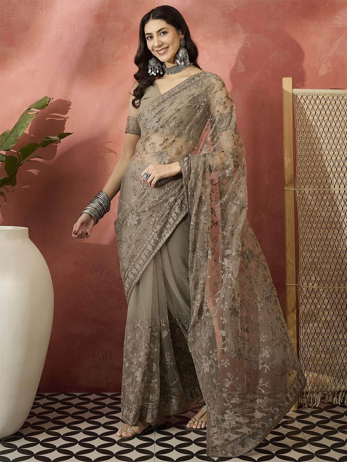 Beige saree Canada by Aromie in lightweight fabric with intricate embroidery, perfect for formal events or weddings.