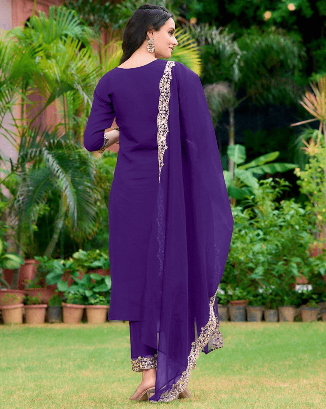 Elegant three piece black cotton kurta set with intricate detailing and stylish dupatta