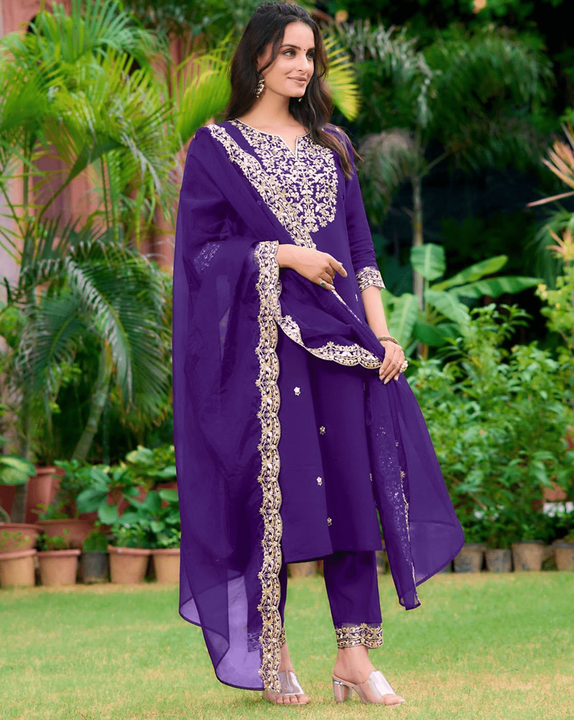 Elegant three piece black cotton kurta set with intricate embroidery for a stylish look