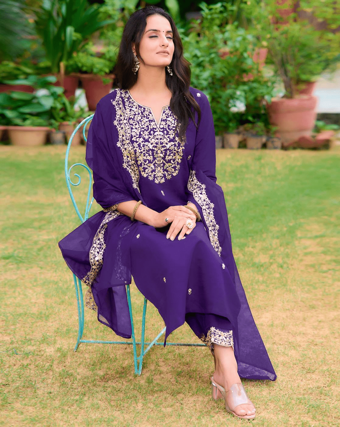 Elegant three piece Kurtha set in purple with intricate embroidery, ideal for festive occasions