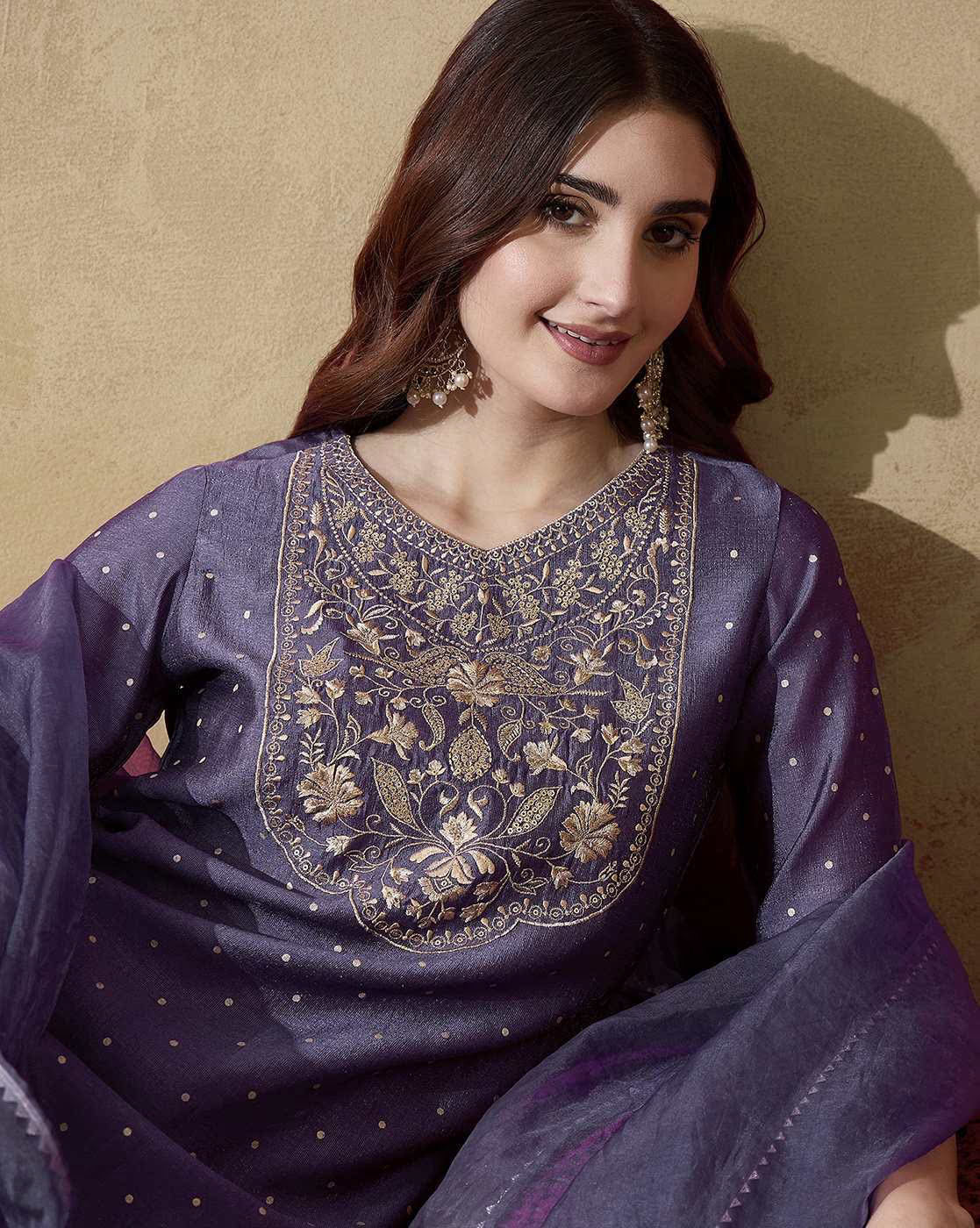 Elegant black floral printed kurta set featuring intricate embroidery and stylish design