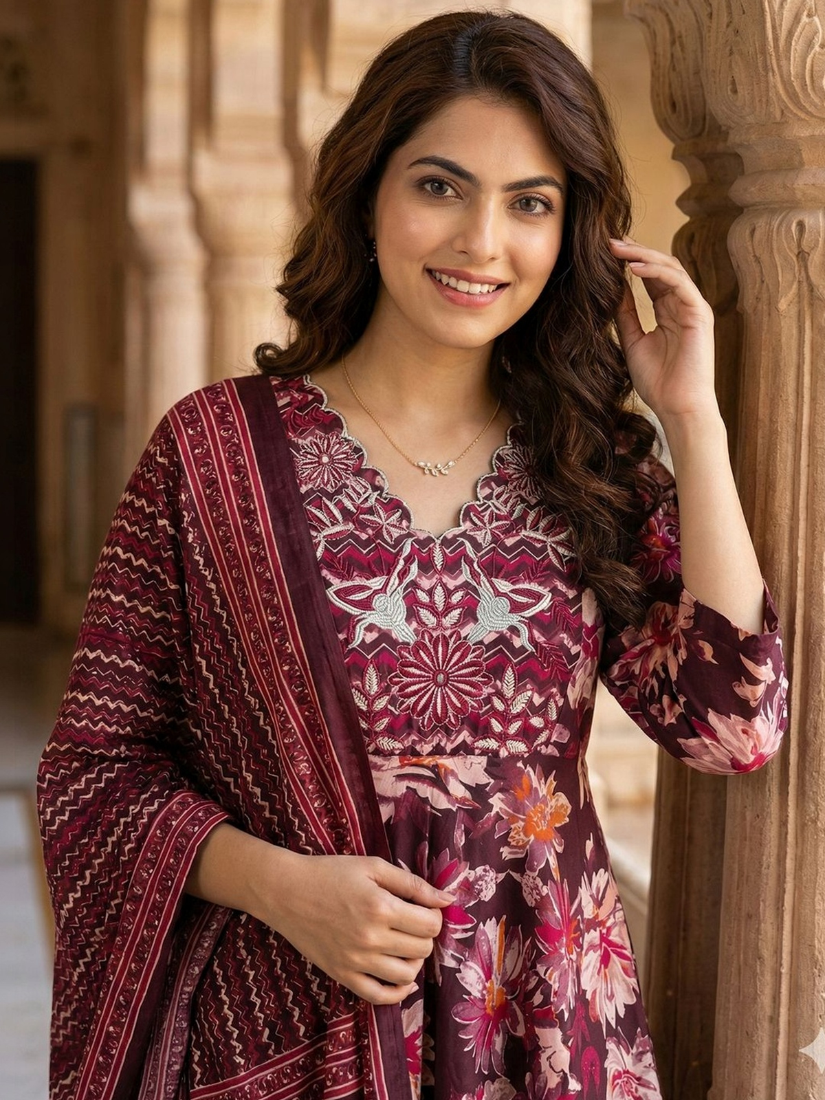 Front view of brown embroidered anarkali kurta set in floral fabric, ideal for festive occasions