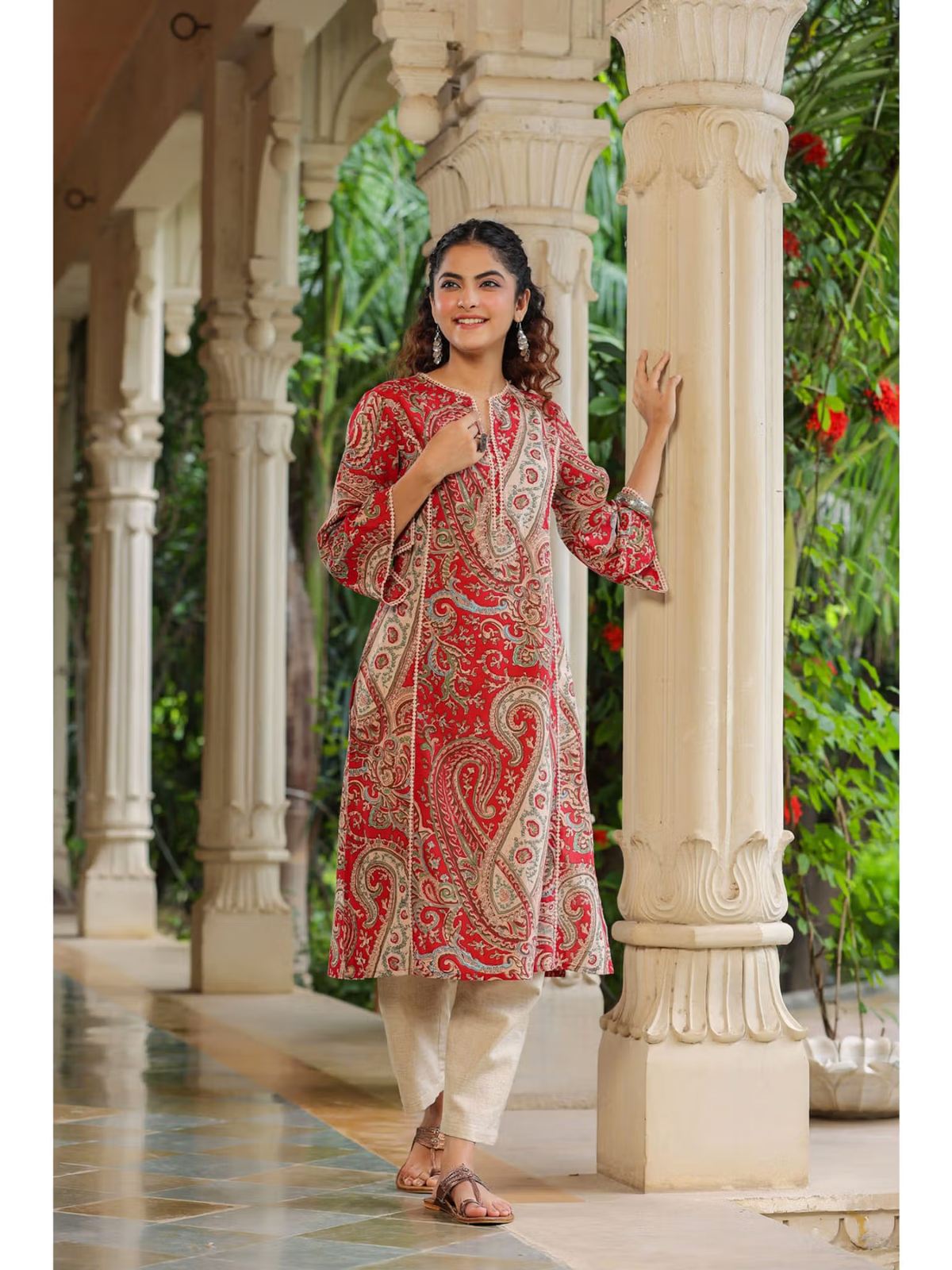 aromie red paisley single piece kurta on model with white pants in veranda floral rayon jumpsuit for women