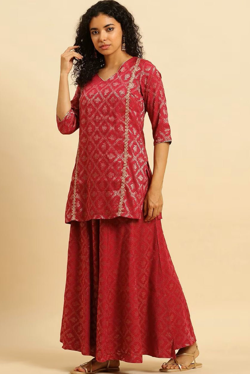 Aromie three piece casual rayon kurta set in red with intricate patterns and a stylish design.