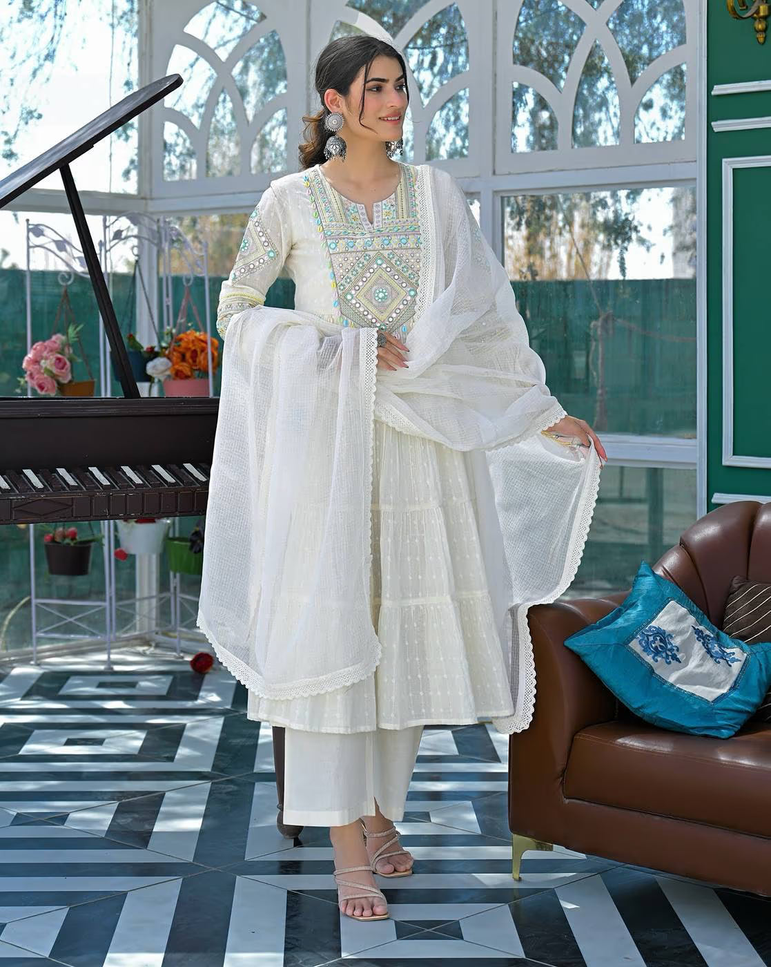 Aromie three piece kurta set in white featuring intricate embroidery for a chic casual look