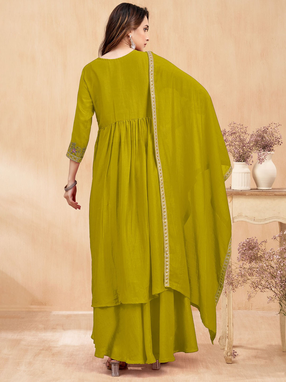 Elegant back view of a three piece Chanderi jacket kurta set Canada in vibrant yellow, showcasing flowing design and details.