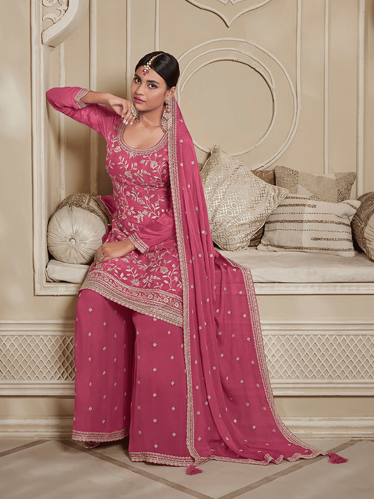 Elegant chiffon sharara kurta set in pink with intricate embroidery and matching dupatta