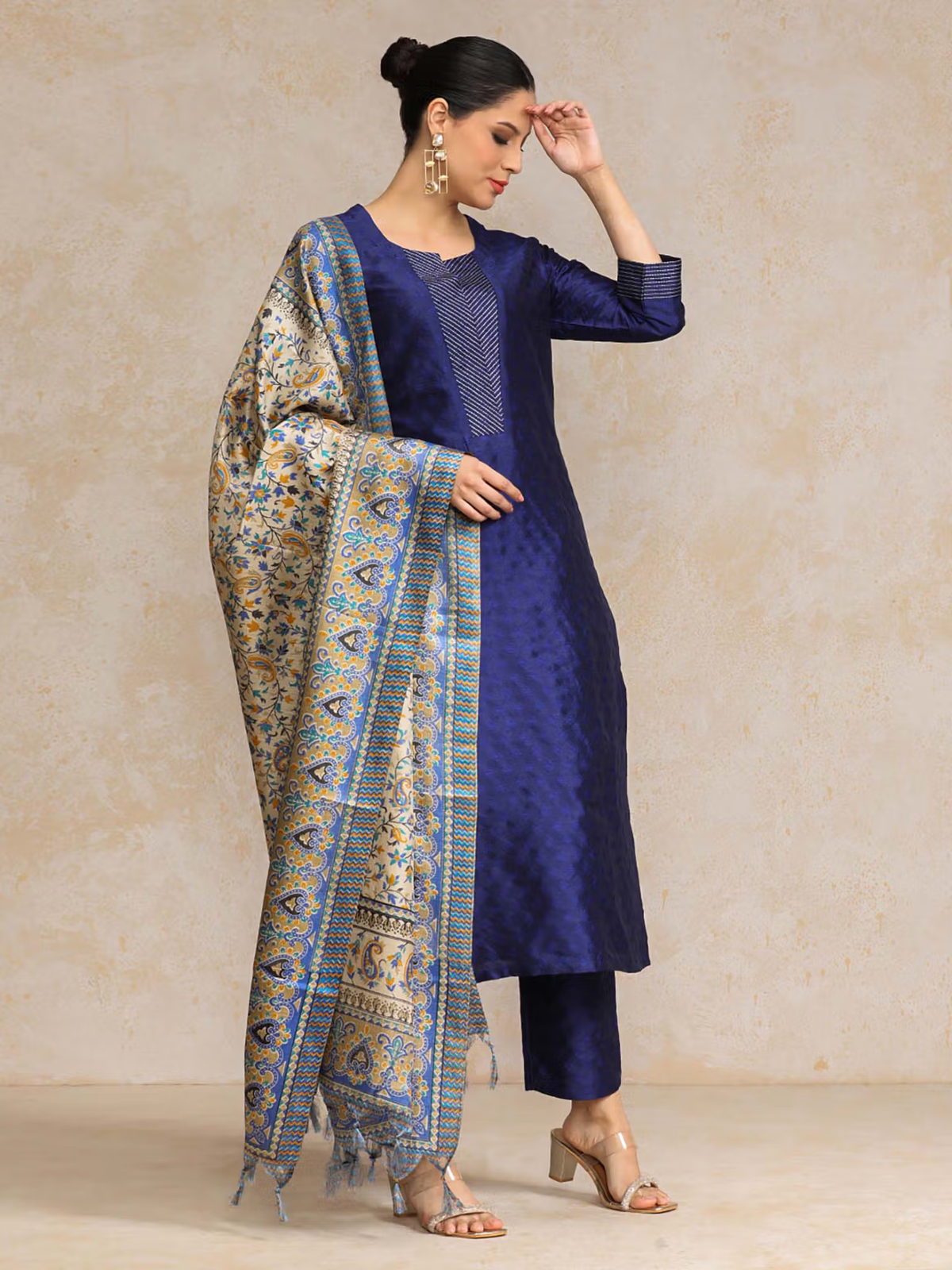 Elegant Chinnon Anarkali Kurta Set in navy blue with intricate patterns and matching dupatta