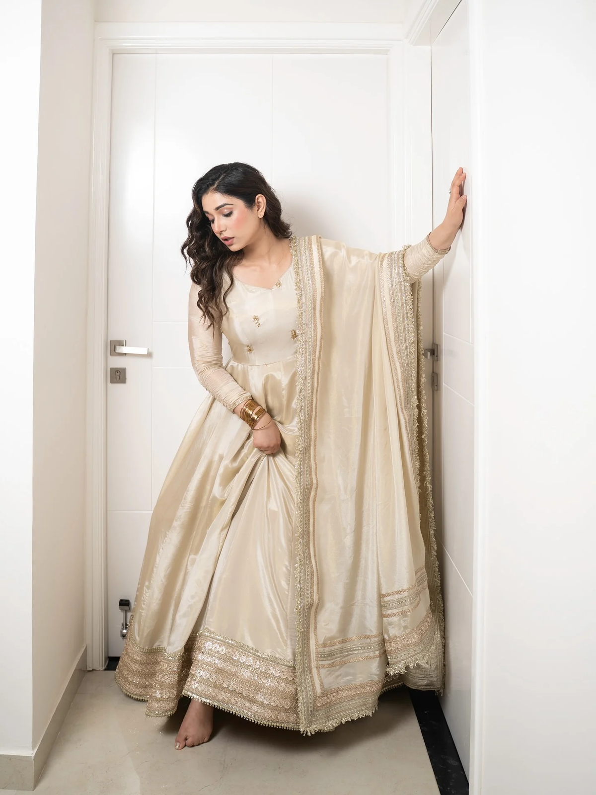 Elegant Chinon embroidered kurta set Canada in cream with intricate detailing, perfect for festive occasions.