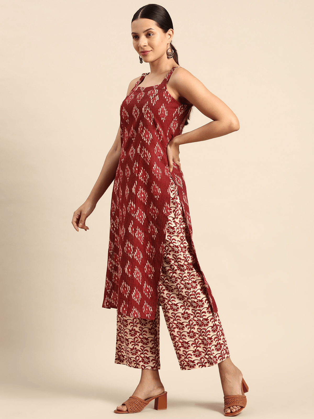 Stylish red cotton kurta set with dupatta featuring elegant patterns and side slits for a comfortable fit