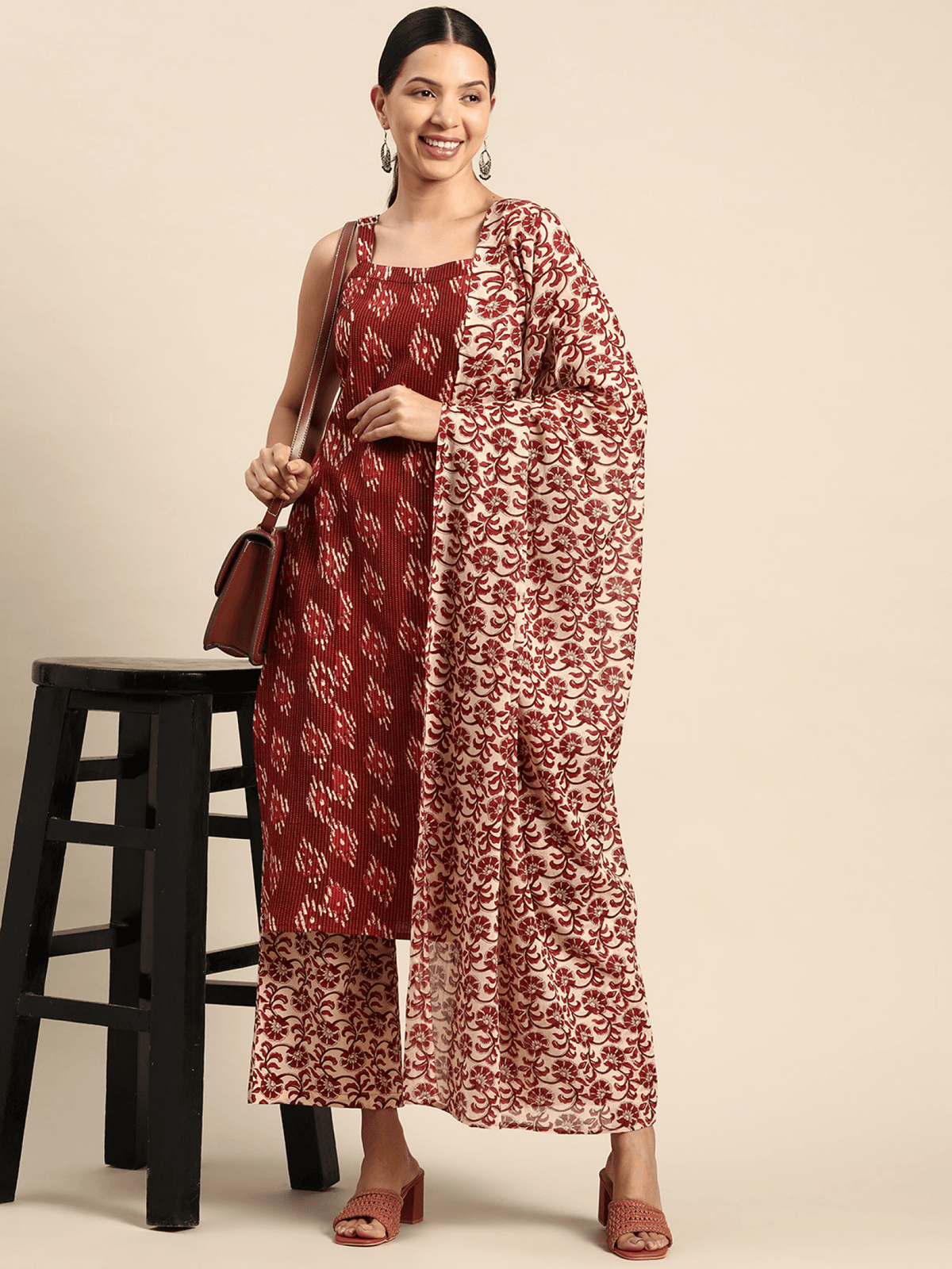 Aromie Cotton Kurta Set with Dupatta in burgundy featuring intricate patterns and a stylish design