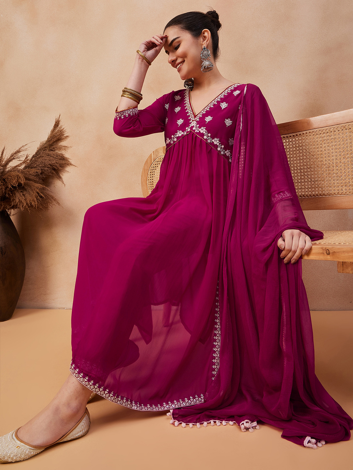 Elegant Aromie Cotton Linen Kurti Canada in vibrant magenta with intricate embroidery details