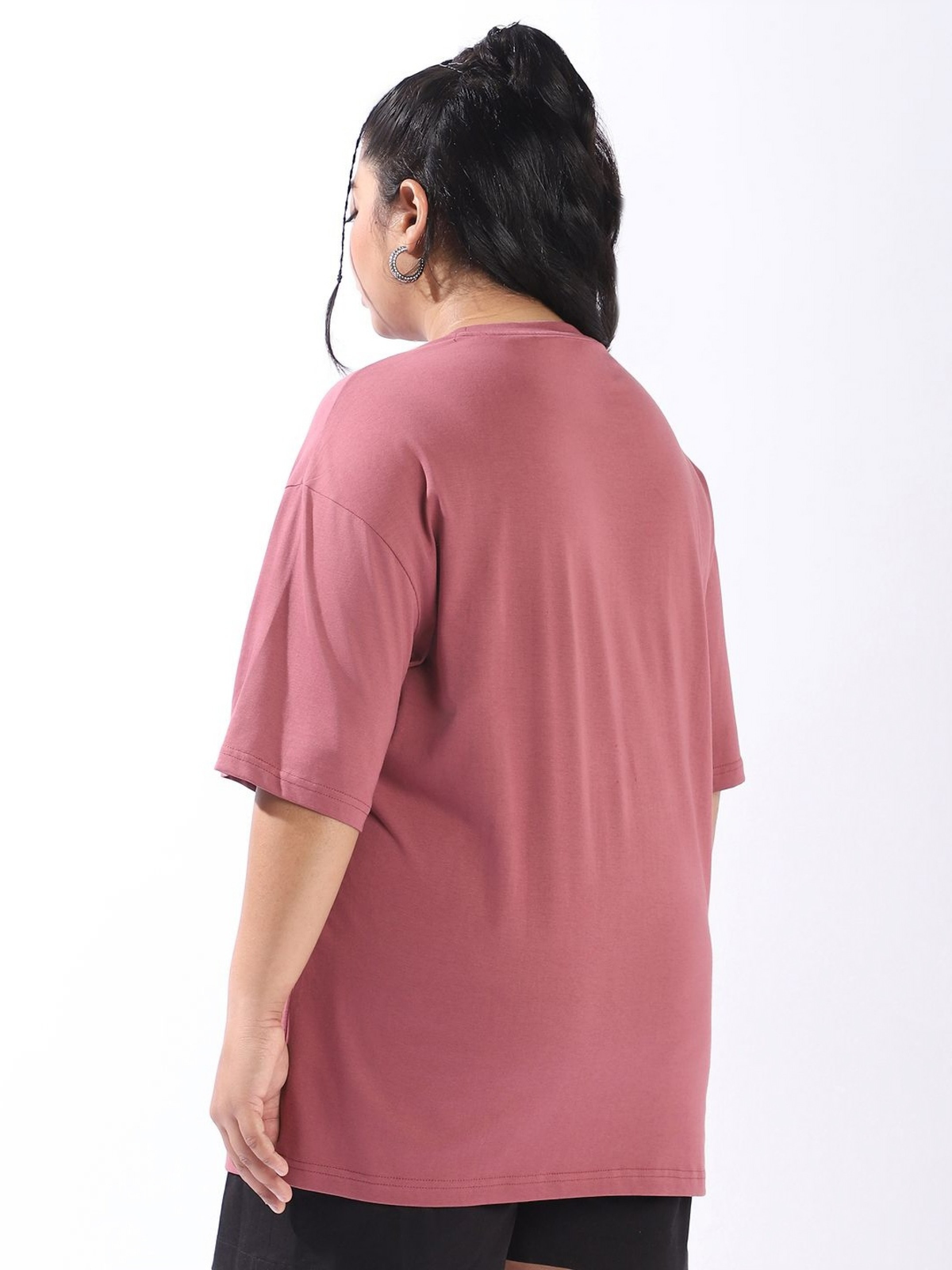 Plus size model back view wearing dusty rose women oversized printed t-shirt with relaxed fit