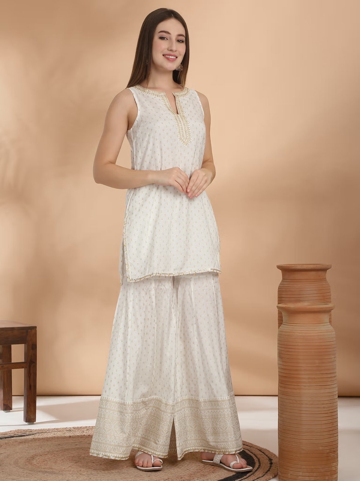 Aromie three piece kurtha white sleeveless embroidered Anarkali suit Canada with gold trim palazzo pants