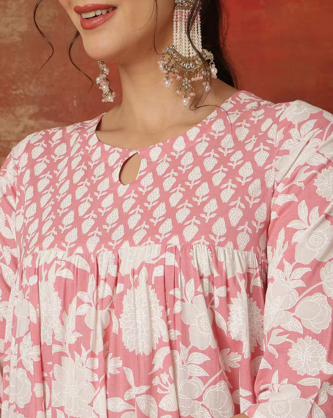 Front view of a pink floral Designer Anarkali Kurta Set with keyhole neckline, ideal for festive occasions