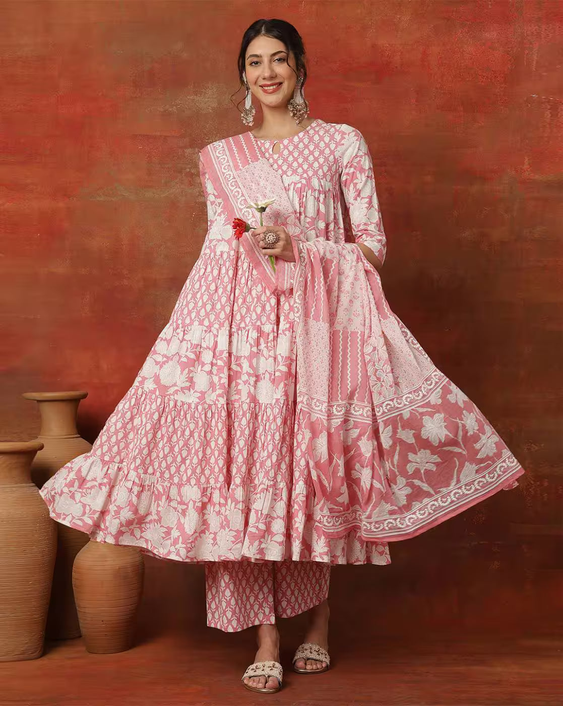 Front view of a pink Designer Anarkali Kurta Set in soft fabric, ideal for festive occasions or weddings.