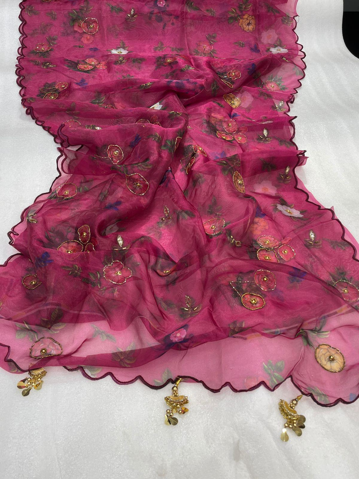 Designer saree in vibrant pink with floral embroidery, perfect for weddings and special occasions in Canada