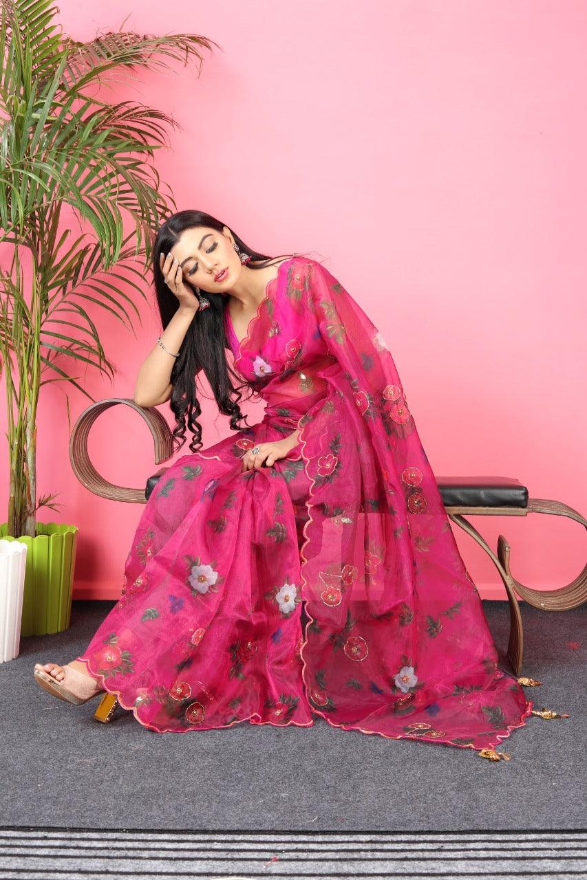Front view of a pink designer saree Canada made from lightweight fabric, perfect for festive occasions.