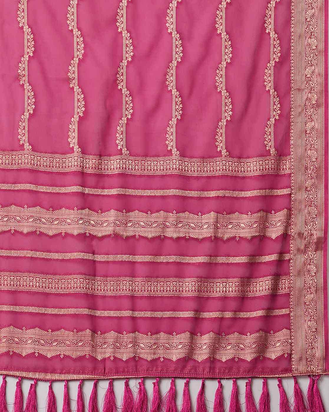 Designer Tussar Silk Saree in pink with intricate golden embroidery and elegant tassels