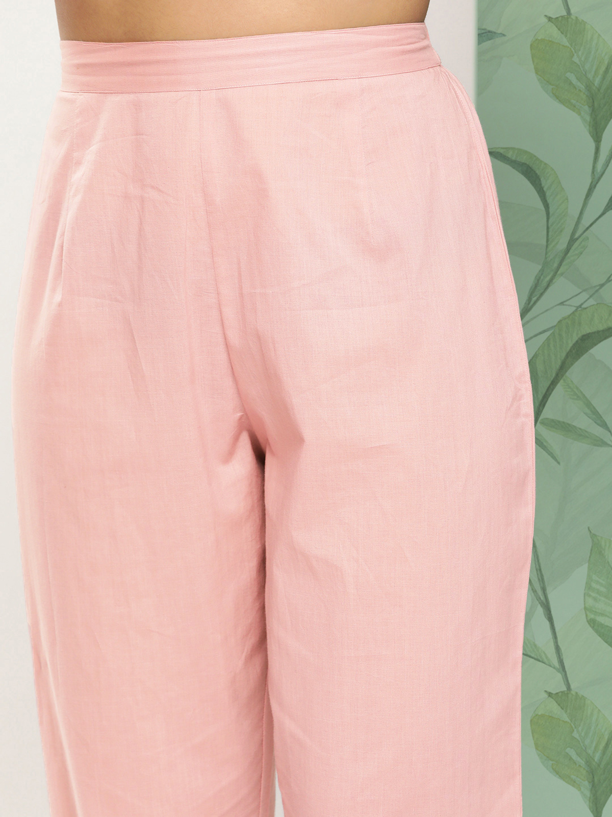 Aromie embroidered cotton kurta set showing light pink high waist straight pants from three piece kurtha