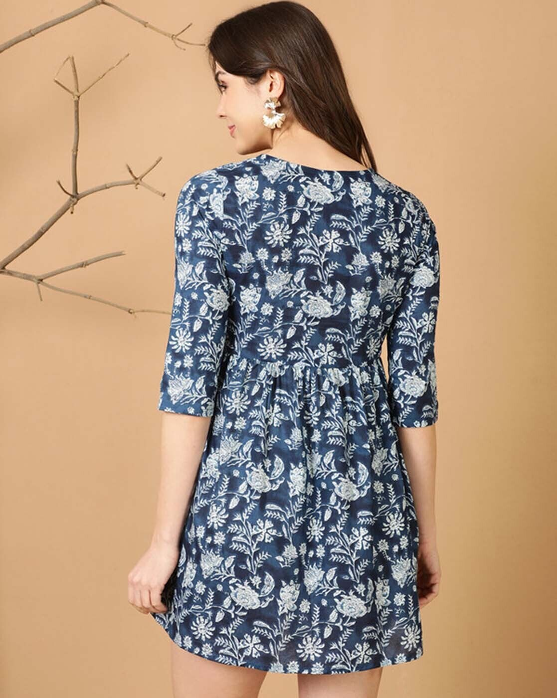 aromie relaxed fit tank top women styled as navy floral short dress with three quarter sleeves back view