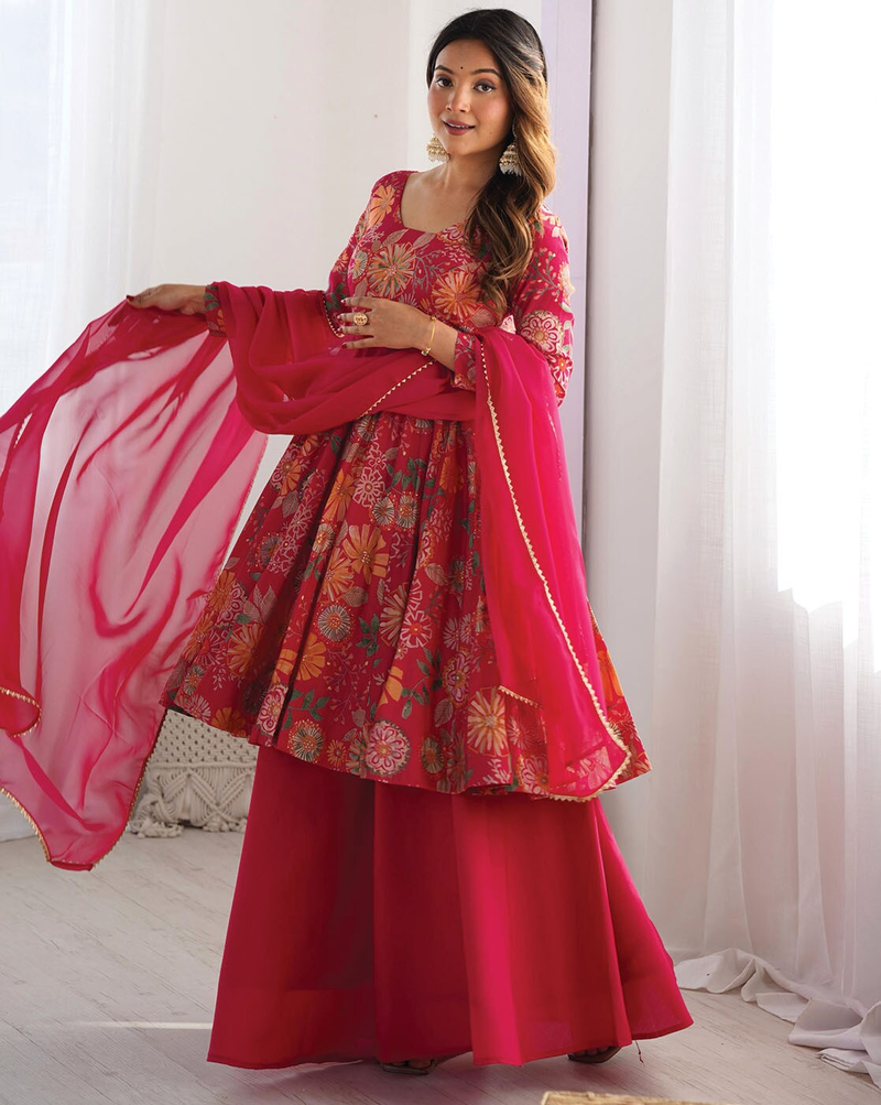 Elegant Indian kurta online in vibrant pink with floral designs and flowing dupatta for festive occasions