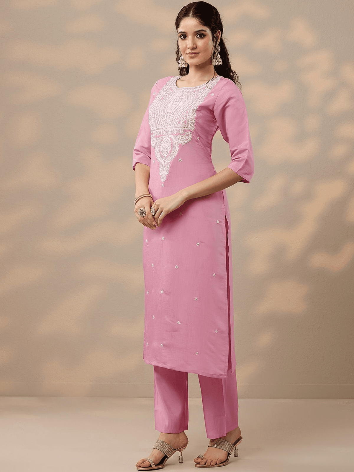 Elegant three-piece pink Indian kurta online with intricate embroidery and stylish cut