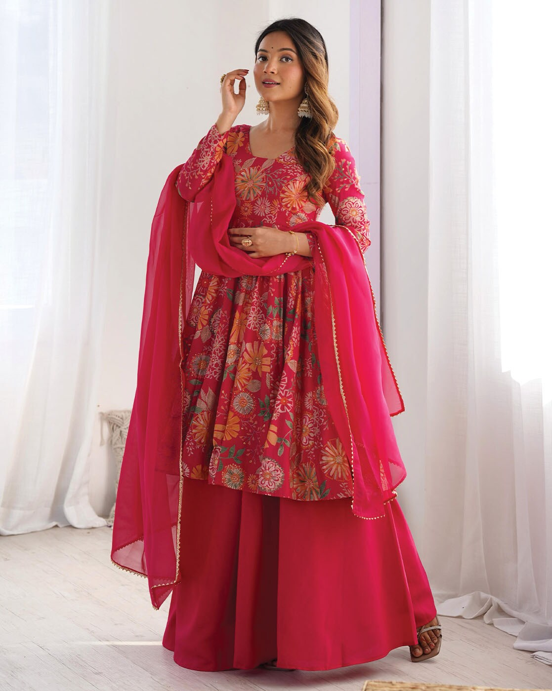 Elegant Indian kurta online featuring a beautiful floral design with a matching dupatta and skirt