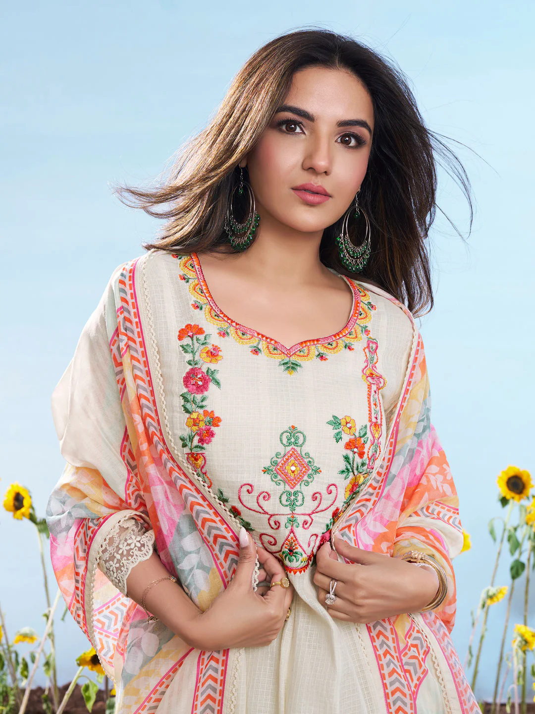 Elegant three piece kurta set in cream with floral embroidery, perfect for festive occasions or casual wear, viewed from the front