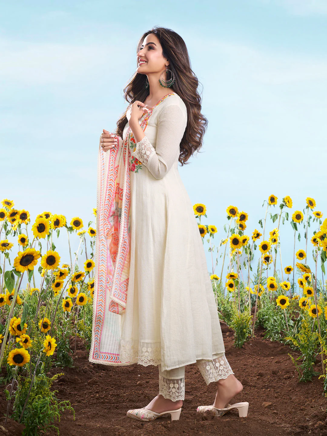 Three piece elegant kurta set in cream with floral details, ideal for weddings, available online in the USA.