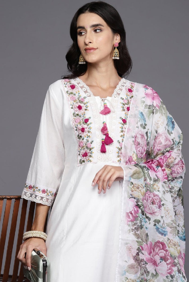 Elegant white kurta set by Aromie with floral embroidery and matching floral dupatta
