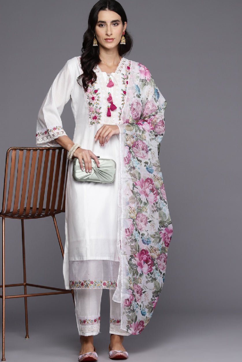 Elegant white kurta set featuring floral embroidery and a stylish dupatta for a chic look