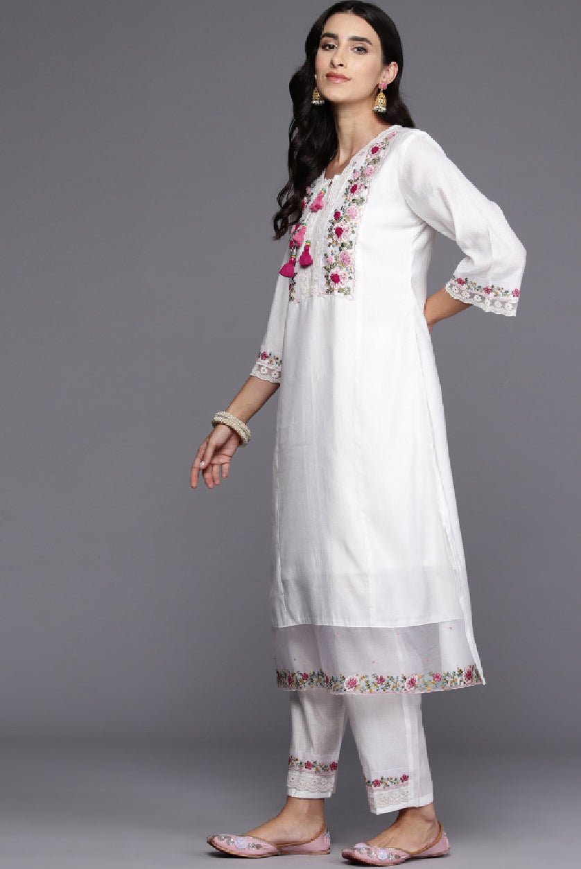 Elegant white kurta set by Aromie with floral embroidery and matching bottom wear