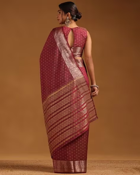 Elegant maroon georgette saree Canda with detailed border, perfect for weddings and festive occasions.