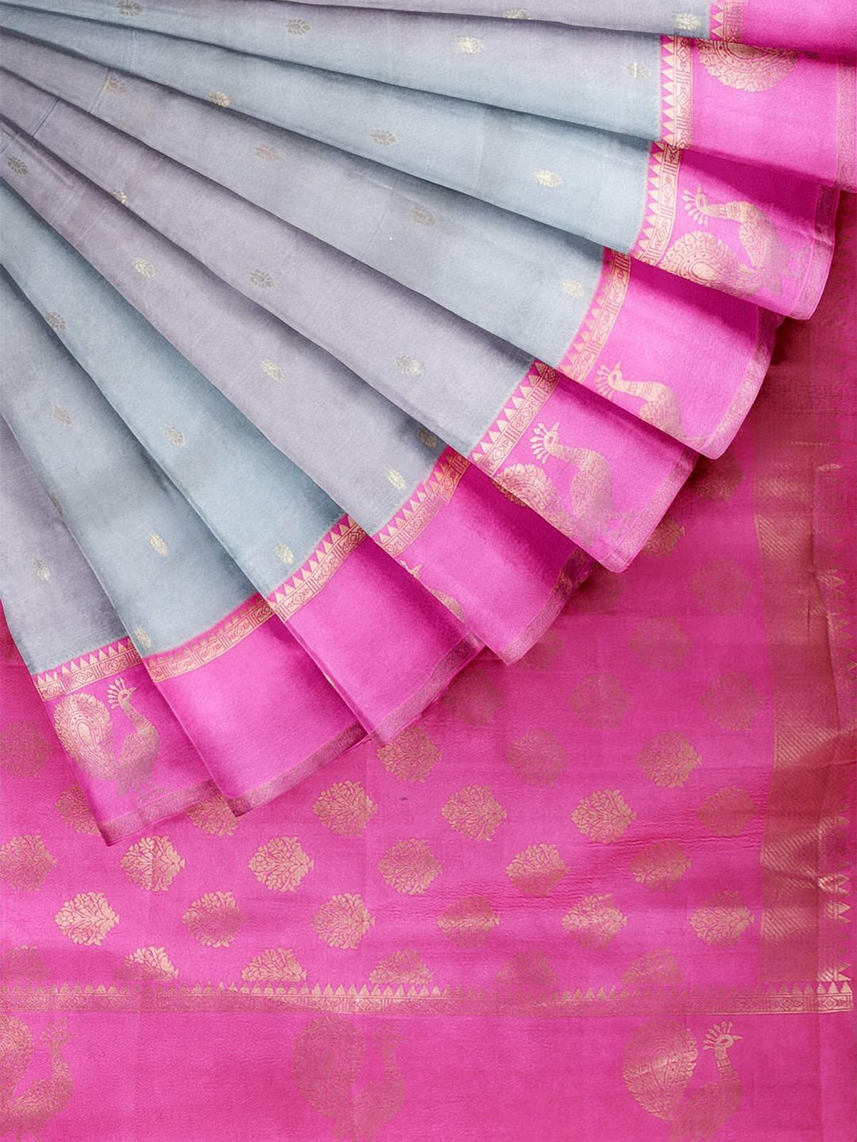 Light blue and pink embellished saree online, made of silk, perfect for festive occasions.