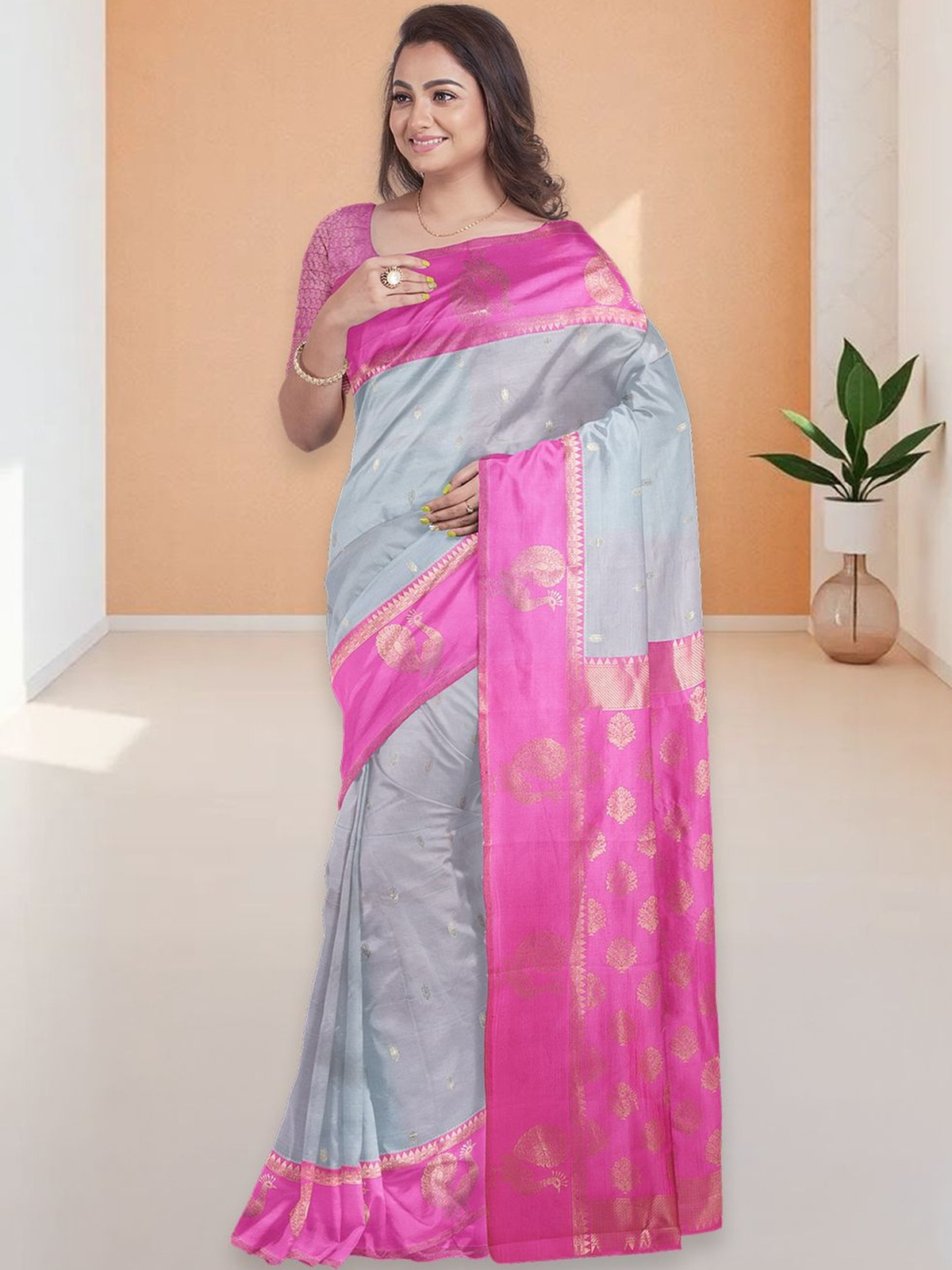 Embellished saree online in light blue and pink, perfect for weddings, crafted from soft fabric with detailed design